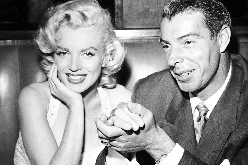 Marilyn with Joe Di Maggio.